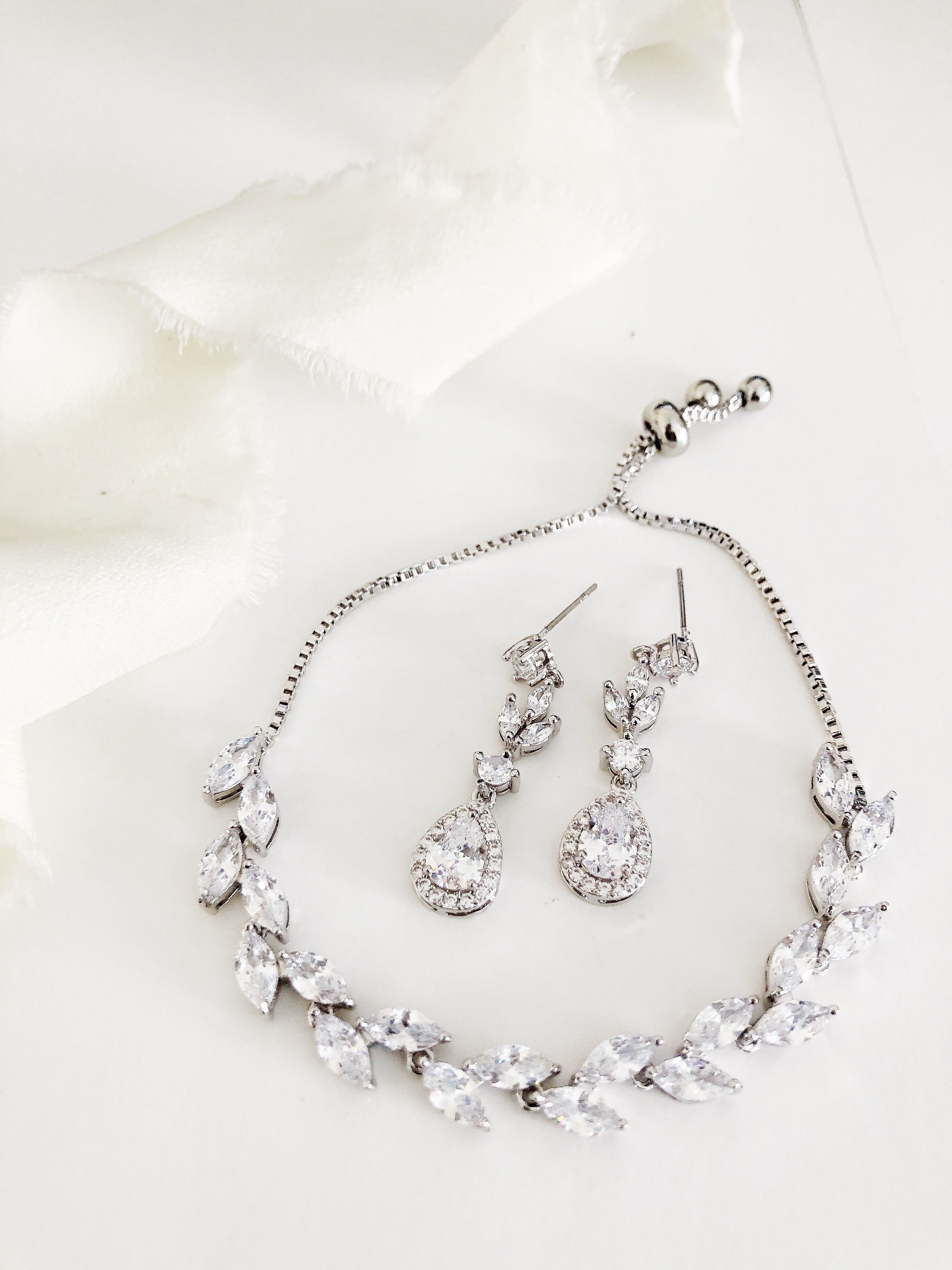 Lainee Silver Diamond Earrings and Bracelet Set